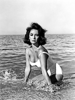 75cm x 100cm Elizabeth Taylor - In the surf von Hollywood Photo Archive